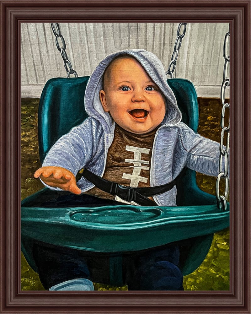 Framed oil painting of a laughing baby boy sitting in a garden swing